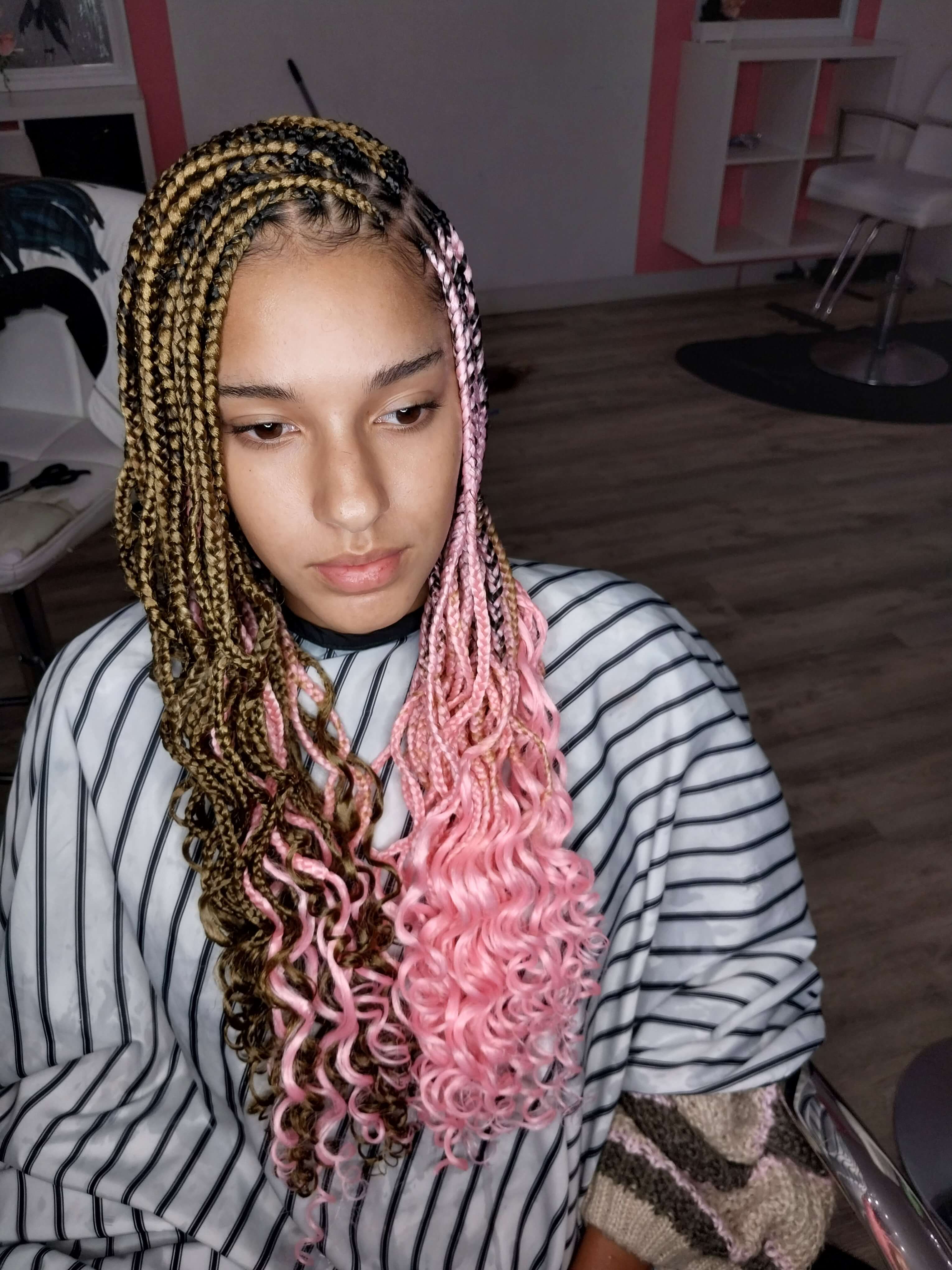 Knotless braids with soft pink curls, styled at FreeStyle Braids Beauty in New Haven